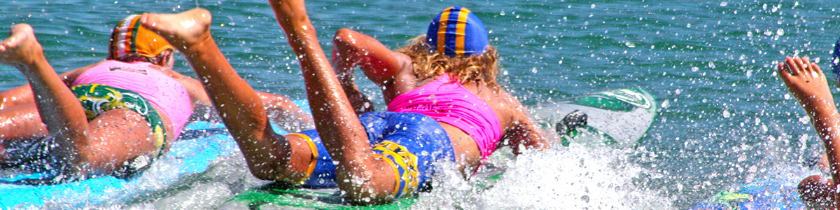 Surd life saving club members on boards in the water