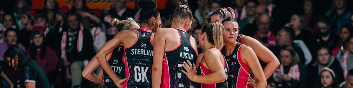 Adelaide Thunderbirds players in a huddle